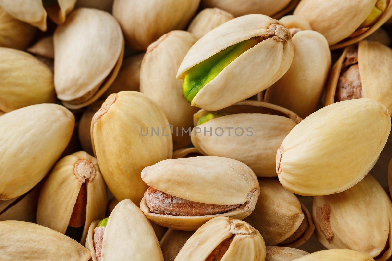 Pistachio texture. Nuts. Green fresh pistachios as texture