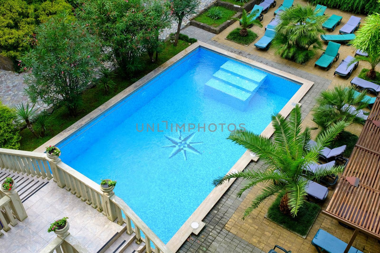 surface of blue swimming pool,background of water in swimming pool. View from above.