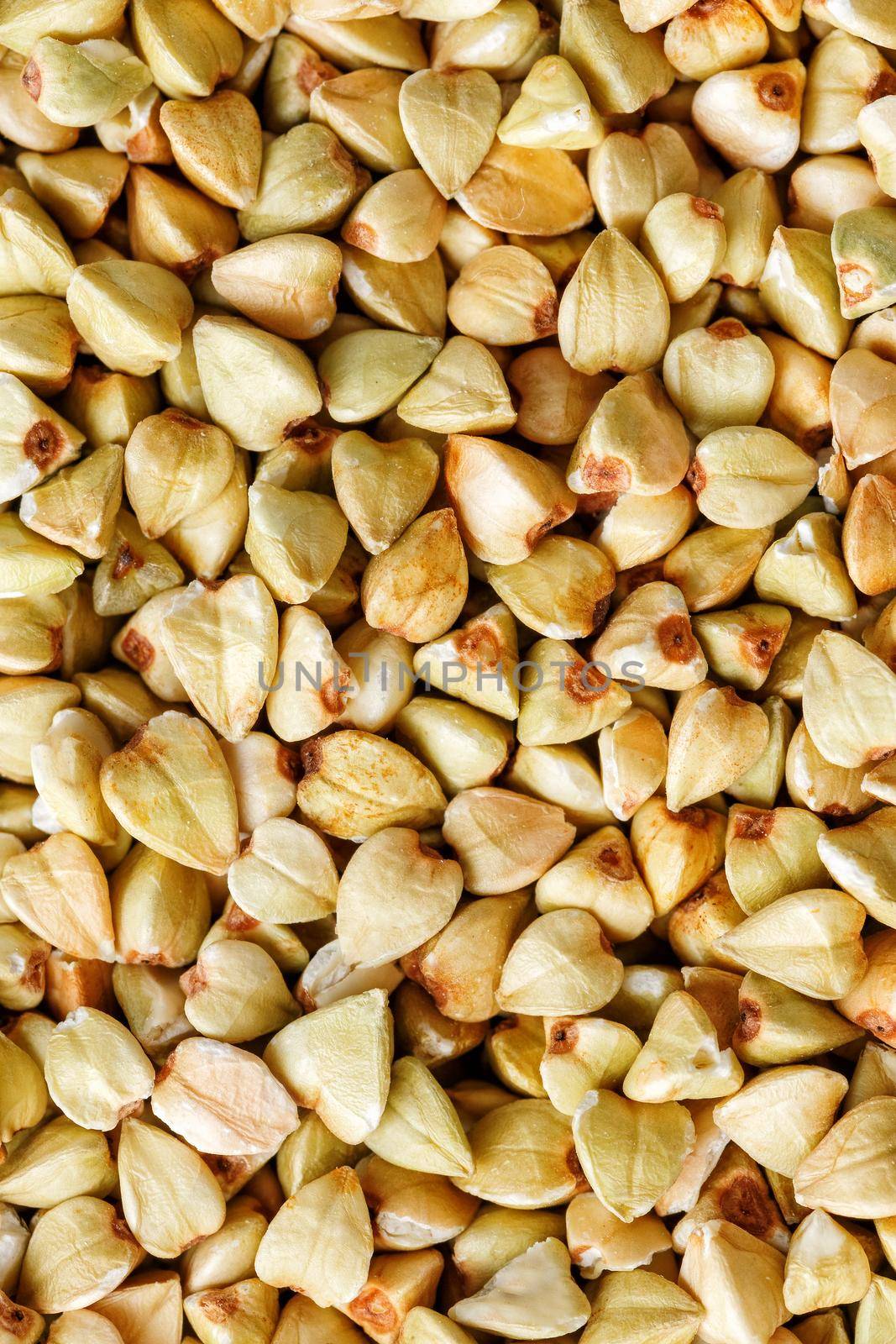 raw green buckwheat background, vegan food. Texture