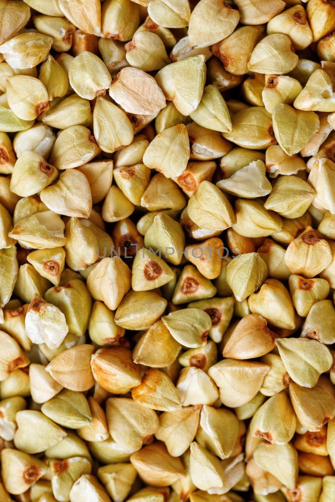 raw green buckwheat background, vegan food. Texture