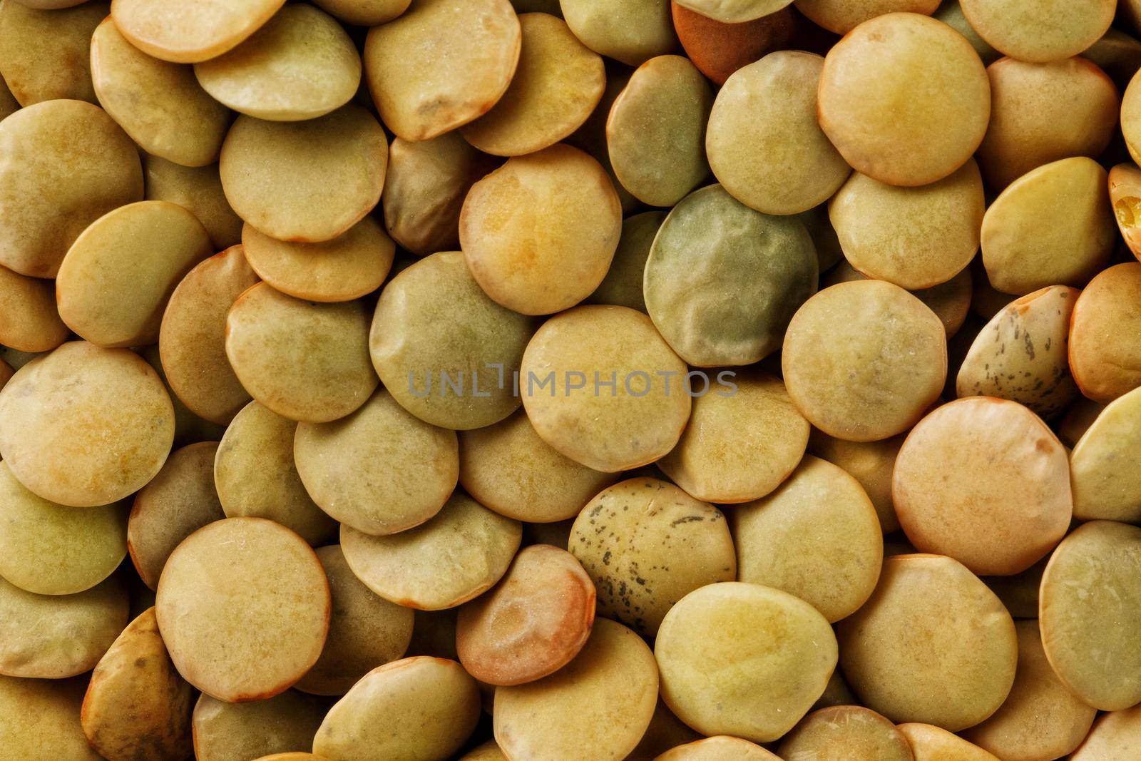Lentils. Lentils background. Green lentils pattern. Natural organic lentils for healthy food by AlexGrec