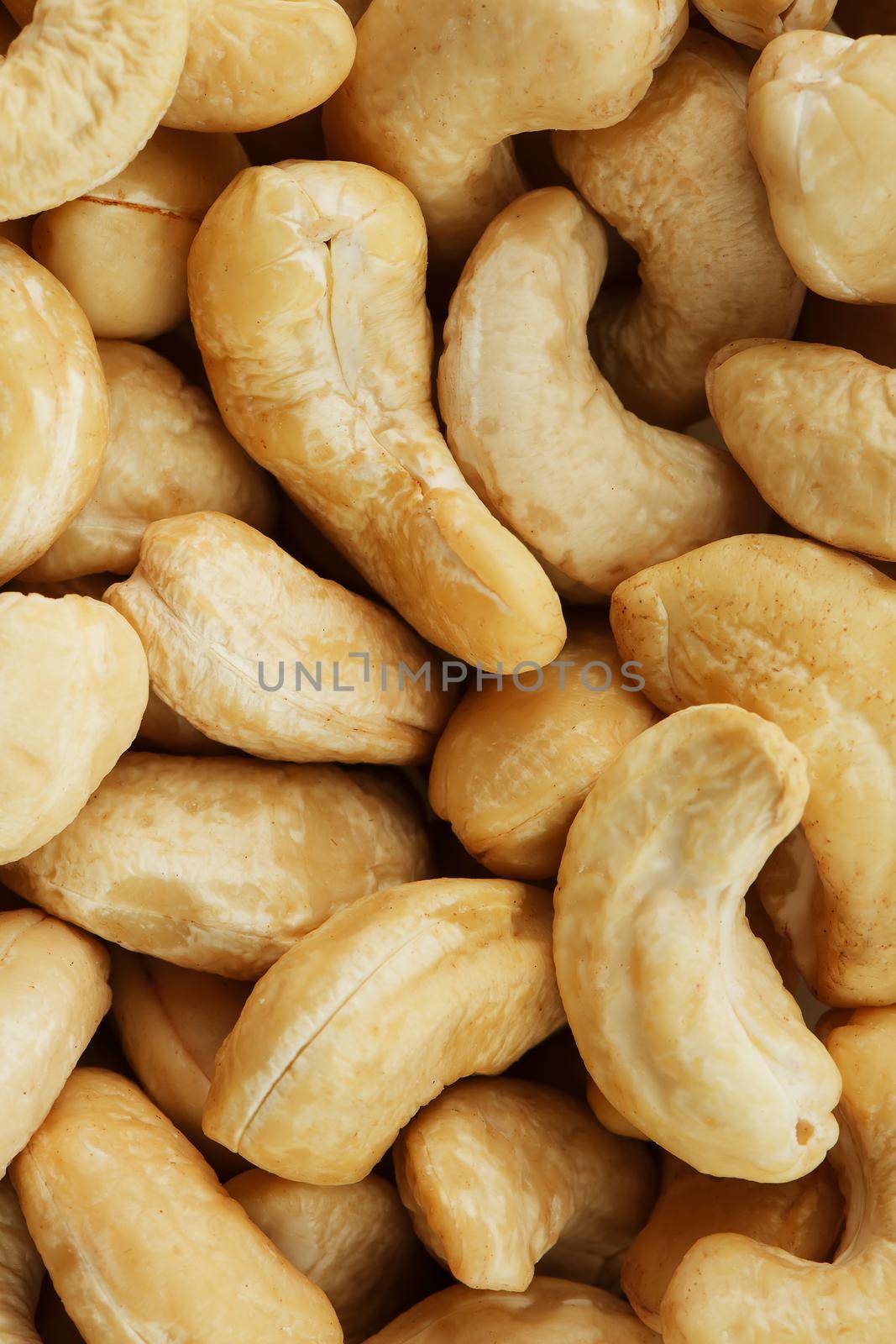Organic Cashew with no shell on a background by AlexGrec