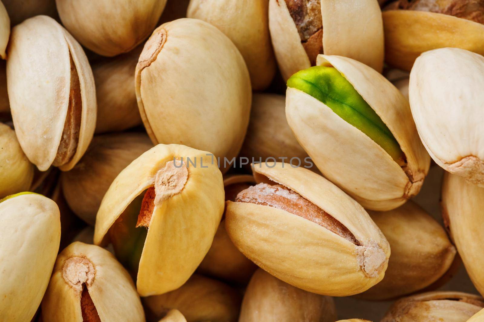 Pistachio texture. Nuts. Green fresh pistachios as texture