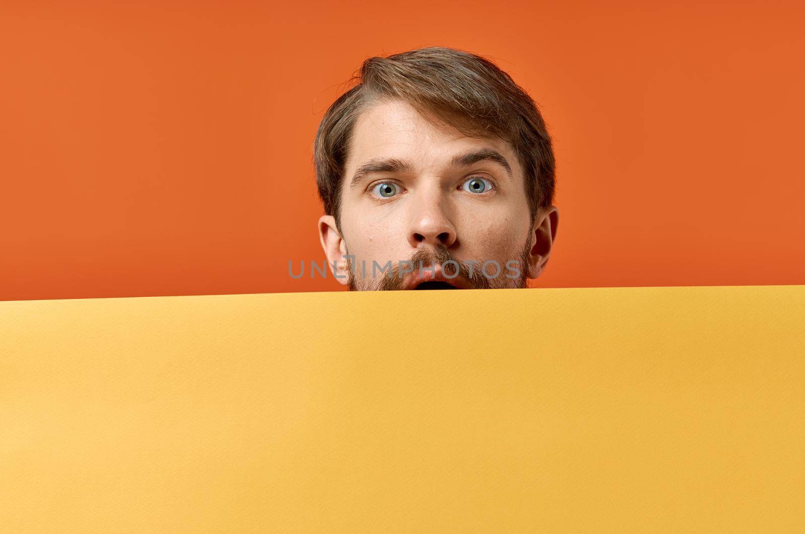 funny man yellow mockup poster discount orange background. High quality photo