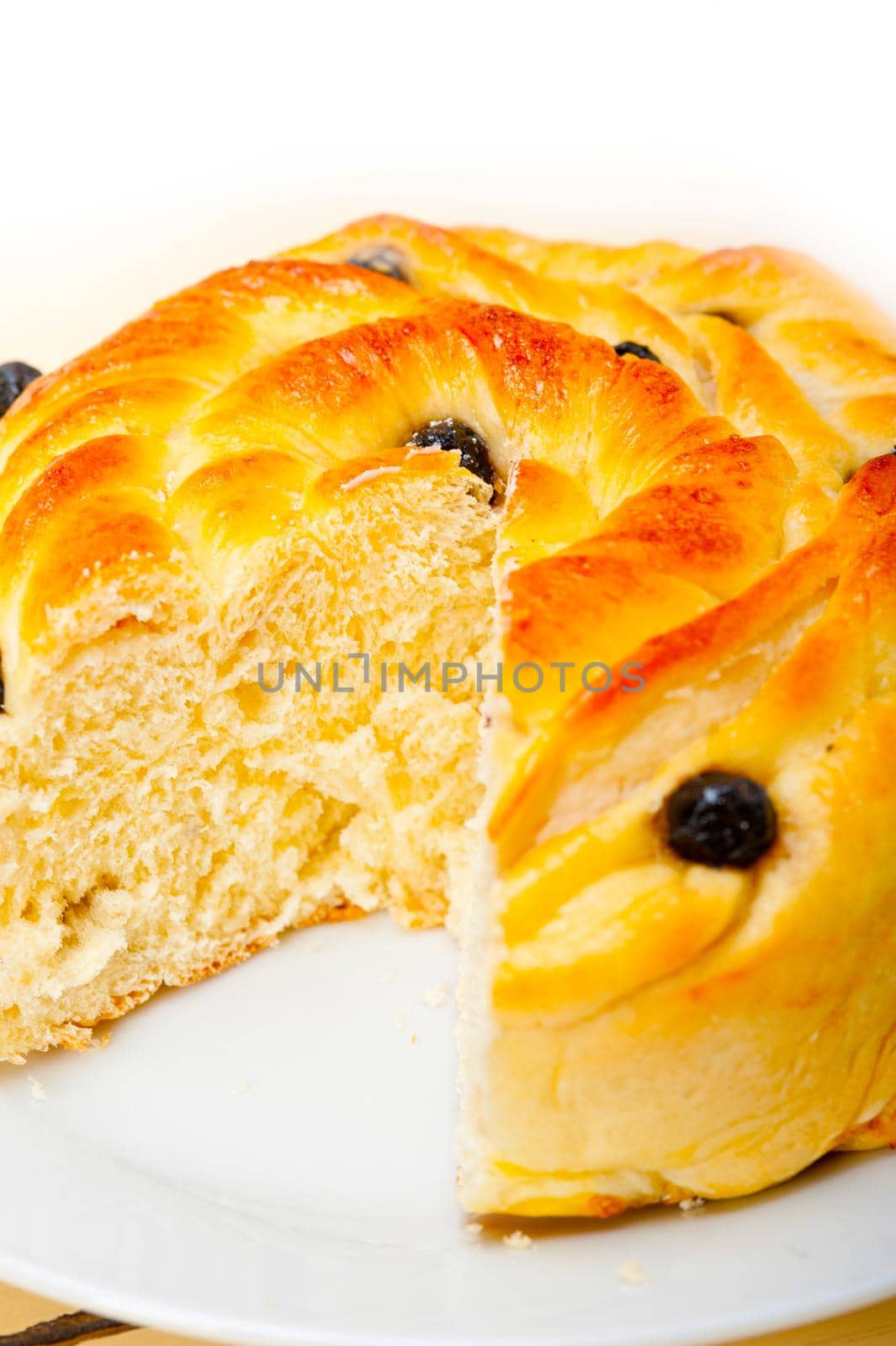 fresh home baked blueberry bread cake dessert over white wood table