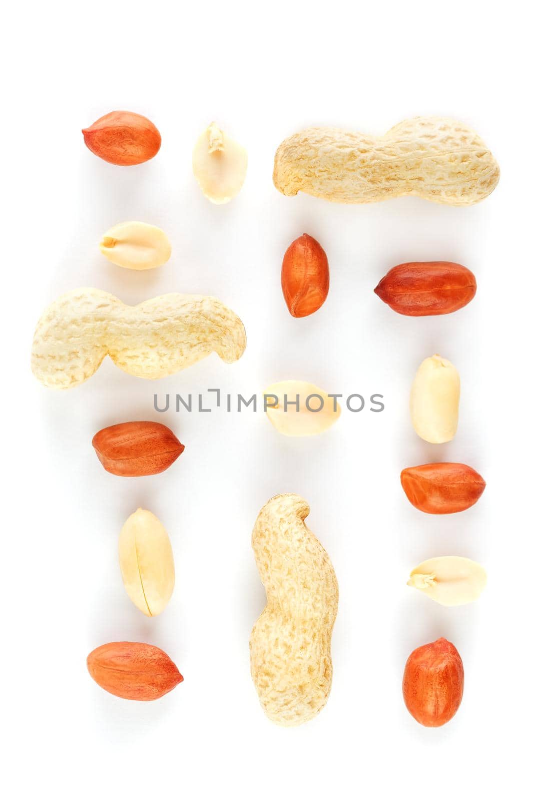 Peanuts isolated on white background. Peeled Peel and Scarlup Macro Peanuts.