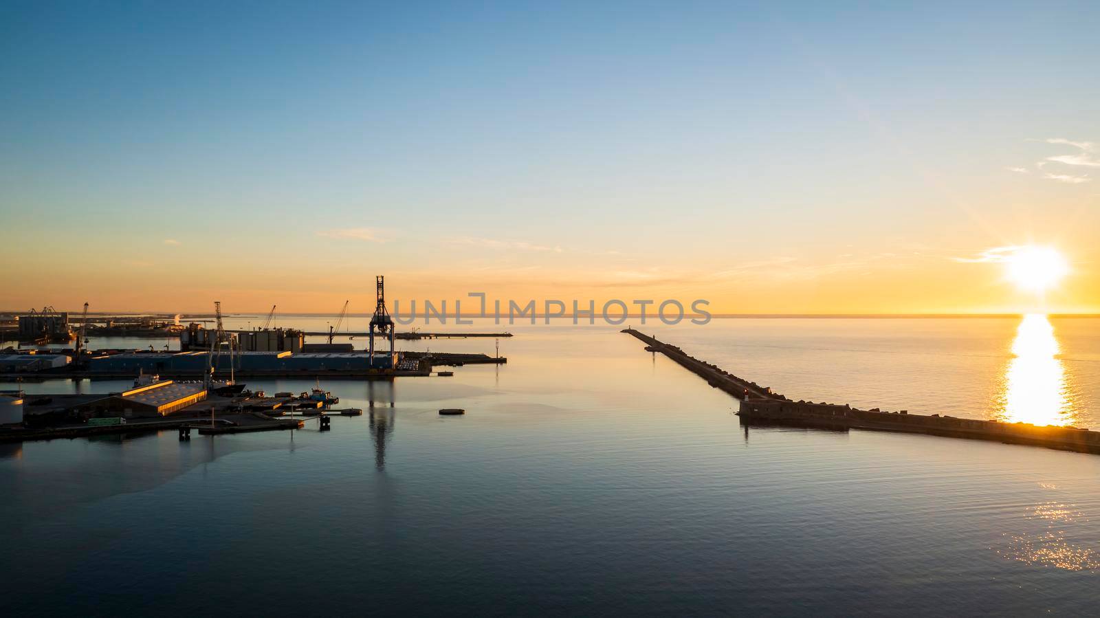 Sunrise over the Mediterranean Sea at Sète on a summer morning, in Hérault, Occitanie, France by Frederic