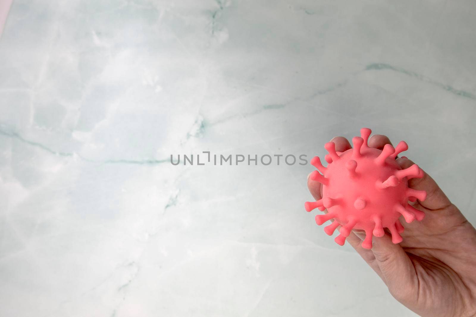 Hand holding Bacteria, virus top view with copy space. Covid-19,coronavirus medical health concept space for text