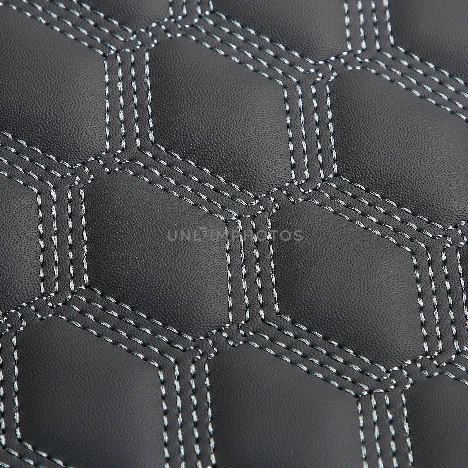 Texture of gray leather background with square pattern and stitch, macro