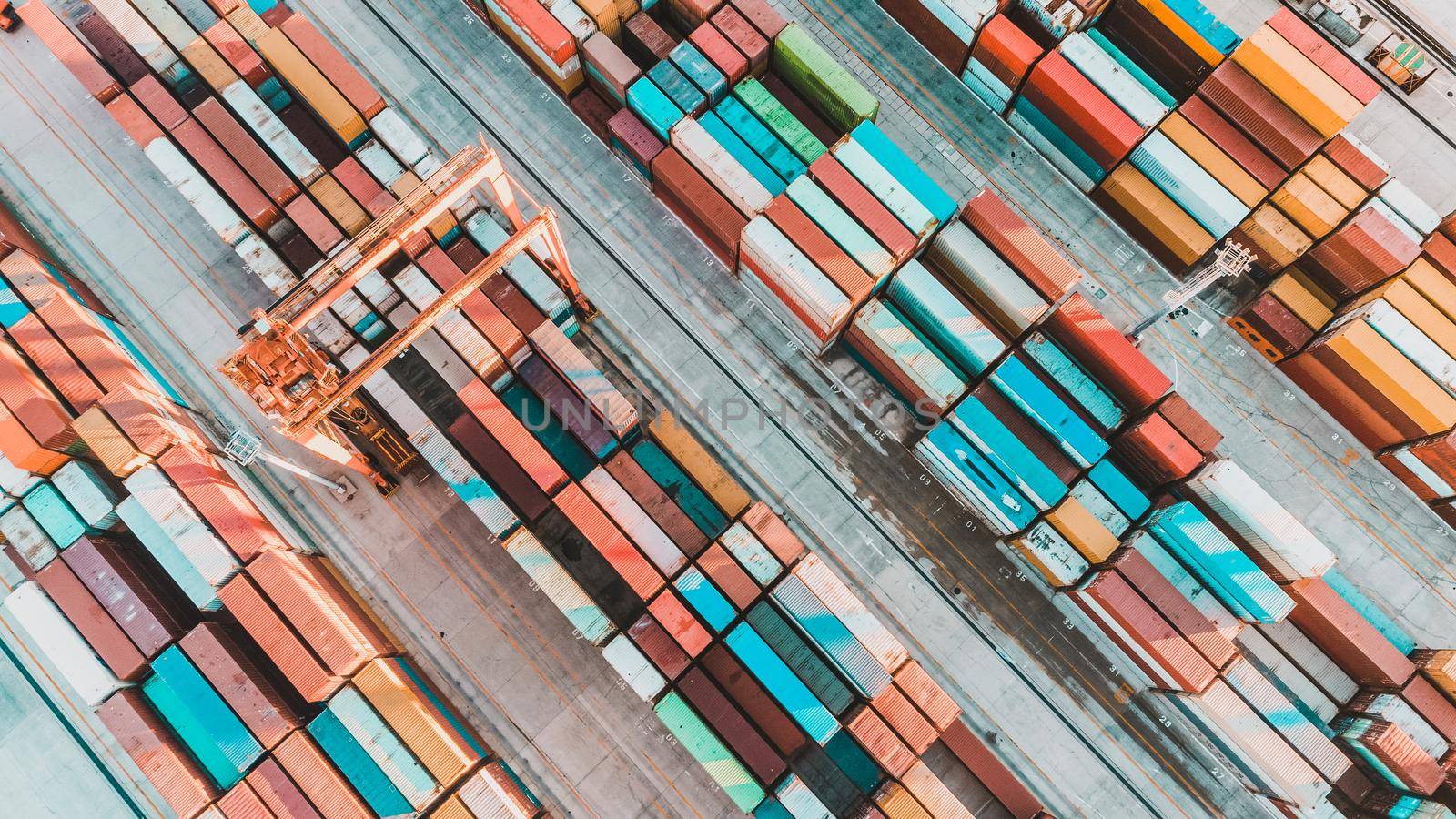 Aerial view of shipping container port terminal. Colourful pattern of containers in harbor. Maritime logistics global inport export trade transportation
