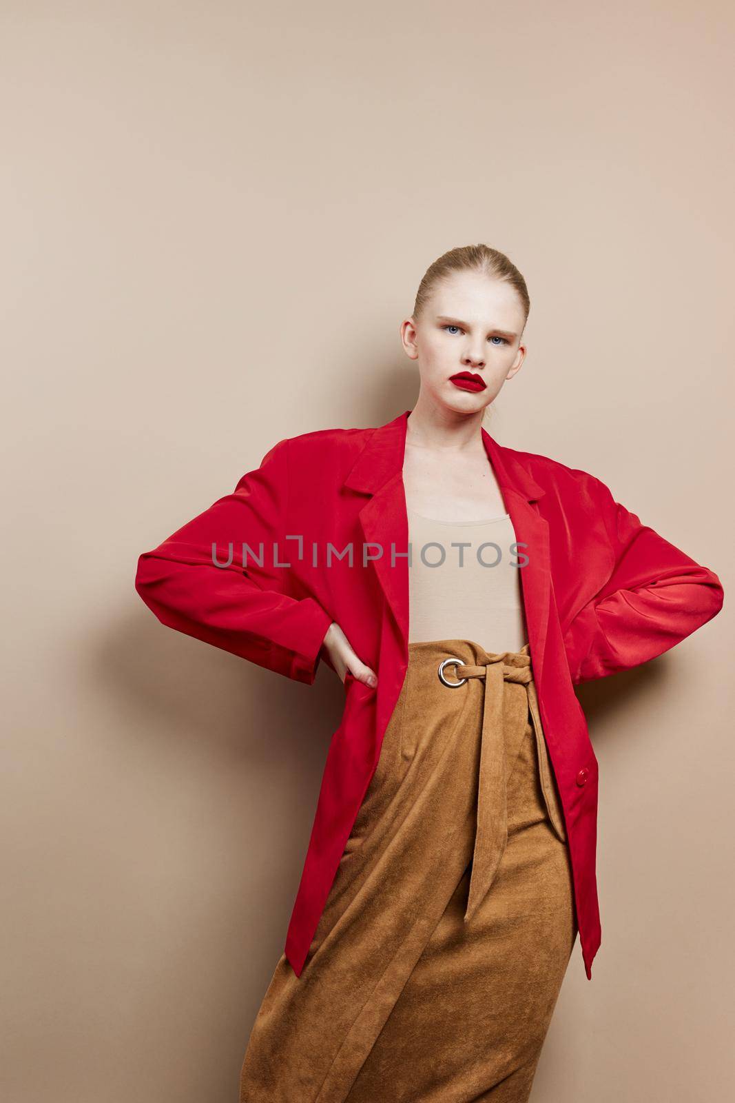 pretty woman red lips fashion jacket isolated background. High quality photo