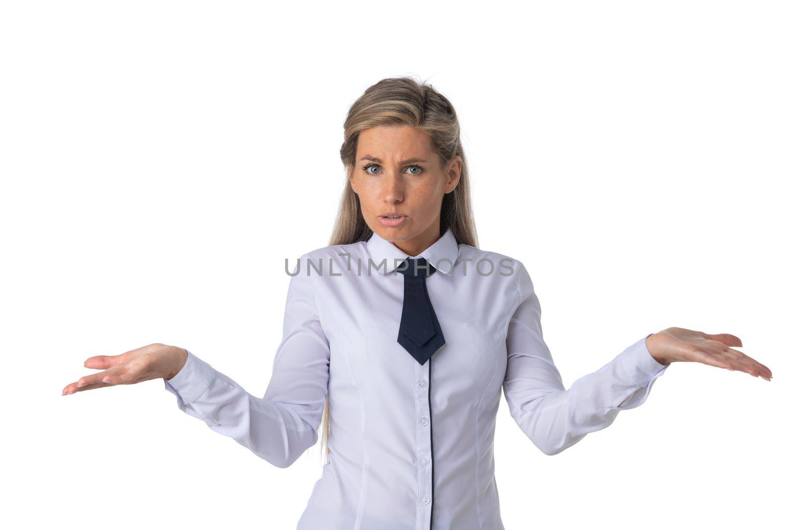 Pretty business woman holding her hands out saying that she does not know isolated over white background. Have no idea concept