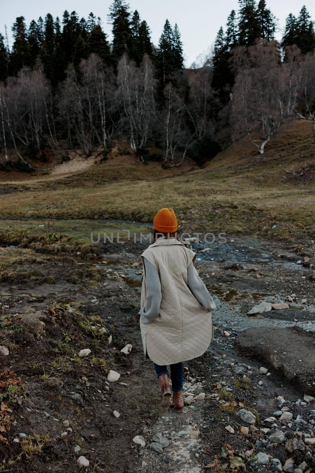 tourist in an orange hat nature autumn river lifestyle by SHOTPRIME