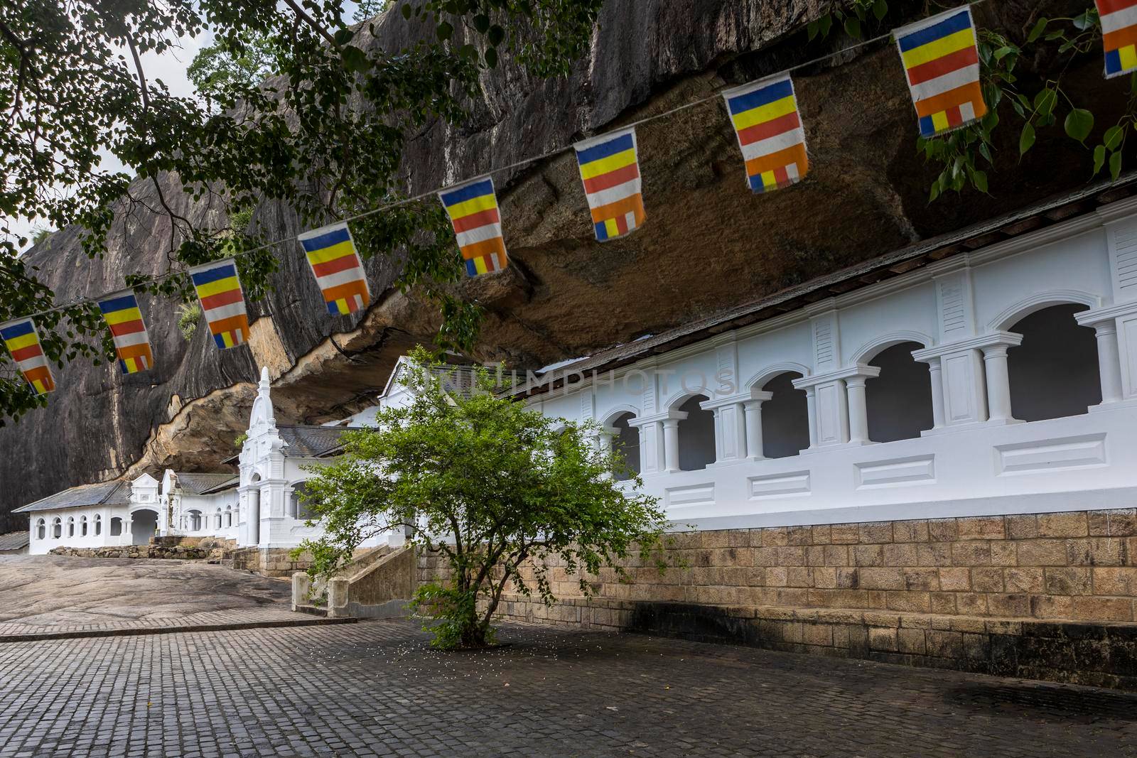 Sri Lanka. Dambulla Cave Temple. Panoramic view from outside with flags. High quality photo