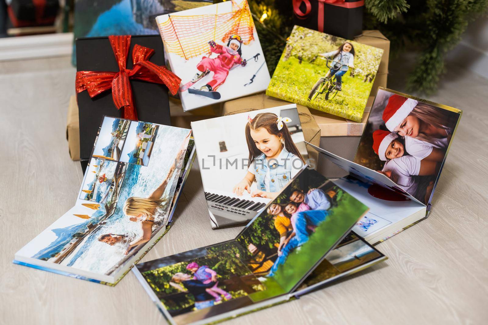 photo books near the christmas tree as a gift.