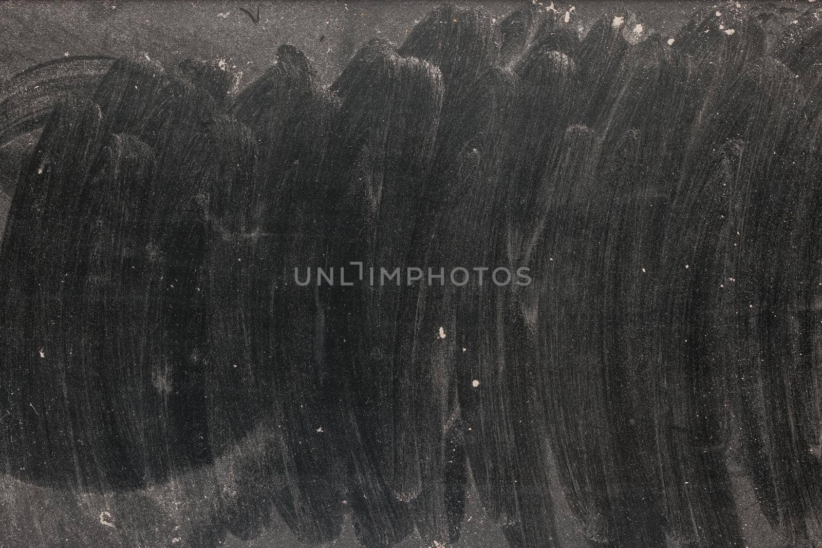 full frame background and texture of dusty black surface of an old LCD screen,