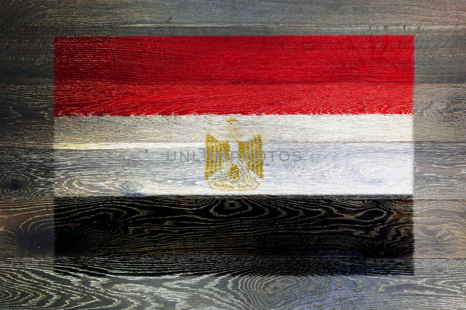 An Egypt flag on rustic old wood surface background