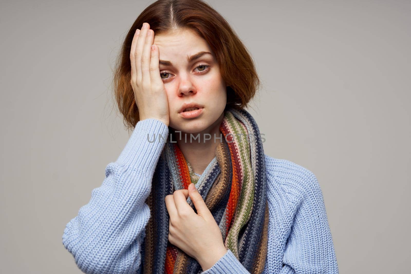 red-haired woman health problems temperature isolated background. High quality photo