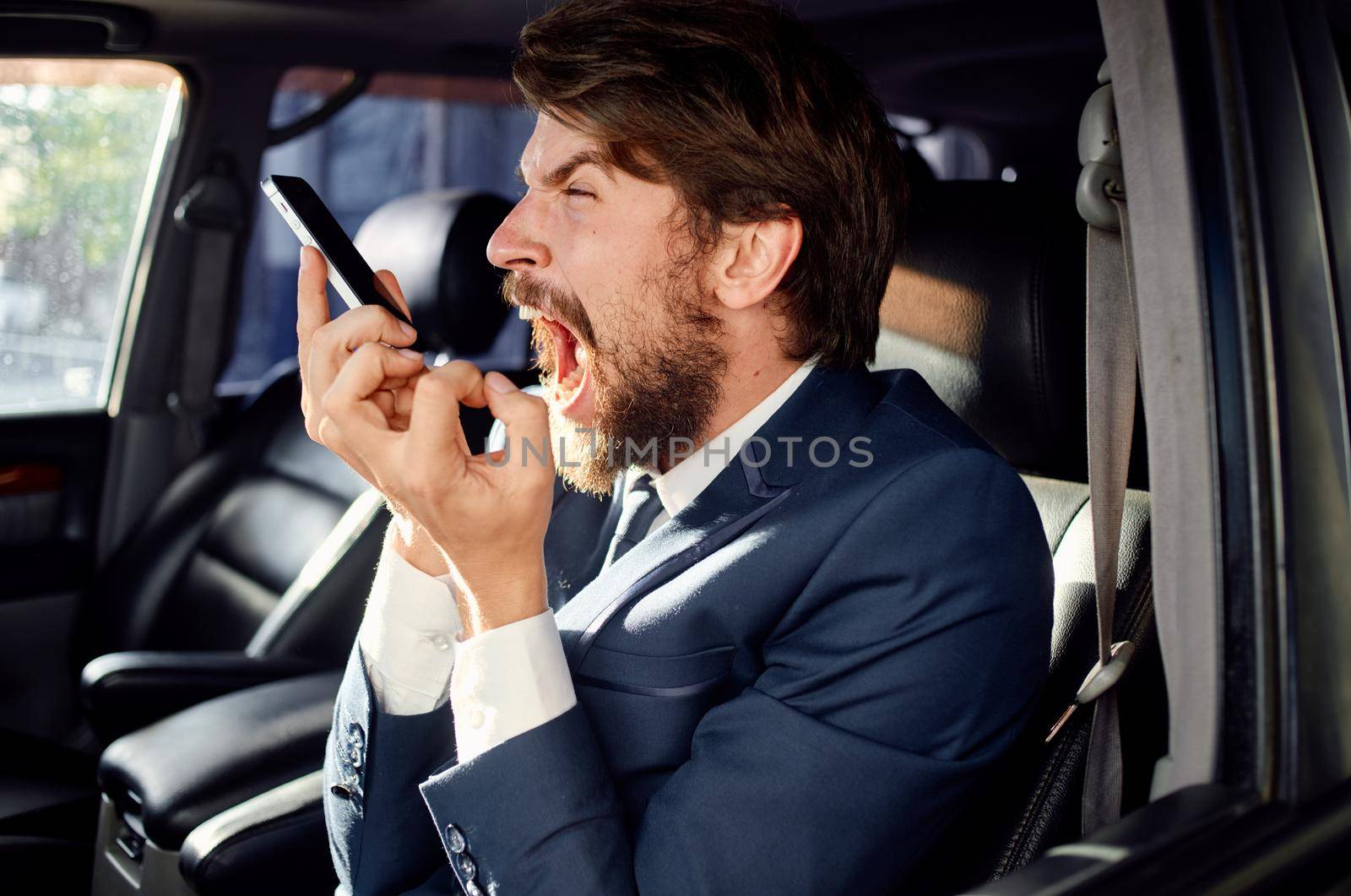 bearded man official passenger driver road success. High quality photo