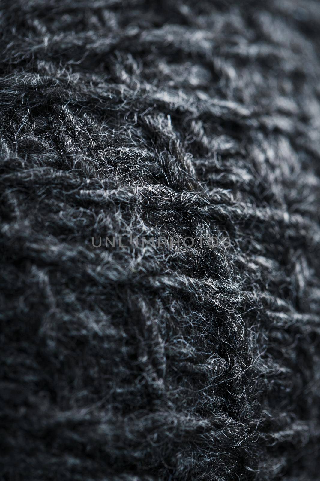 Gray threads of natural wool close-up in full screen. Macro