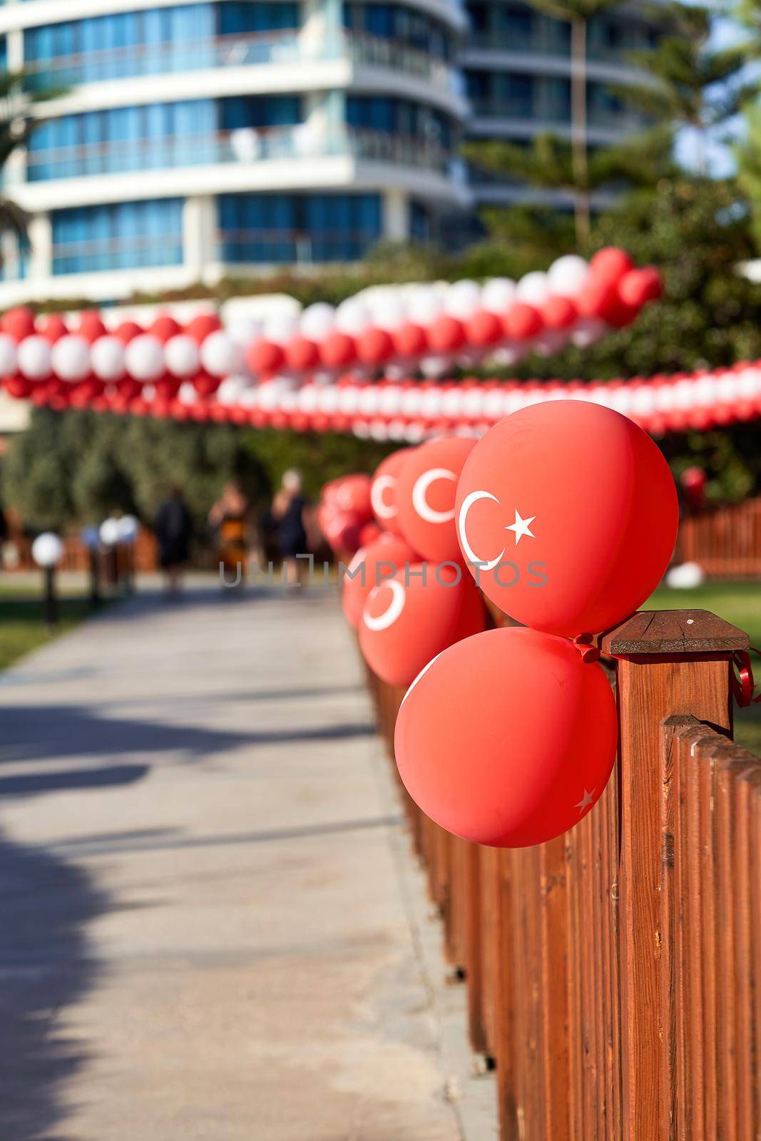 Red balloons with the emblem of the flag of Turkey decorate the street. Turkey Independence Day