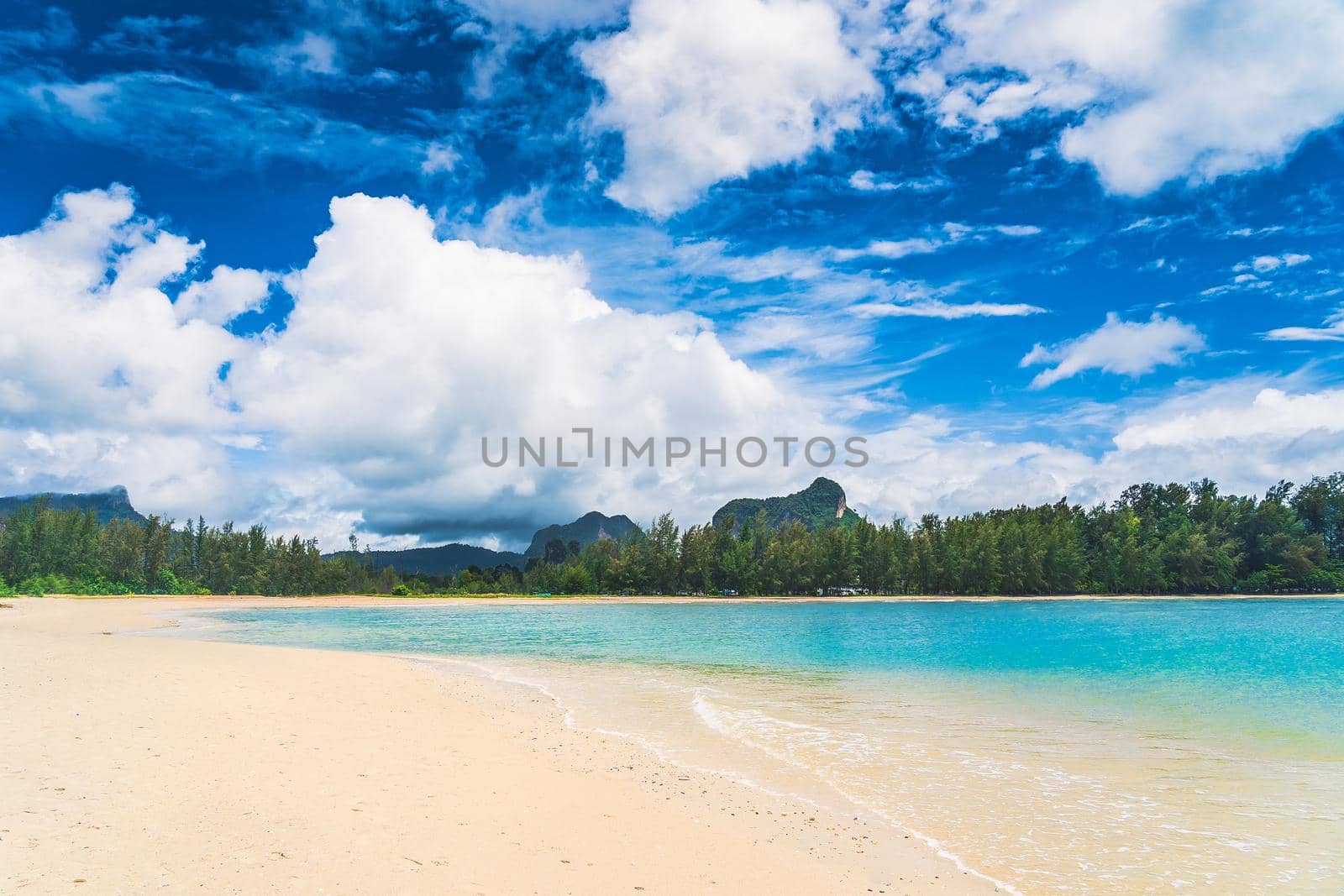 Beautiful white beach and blue sky at Nopparatthara beach,, Krabi, Thailand.