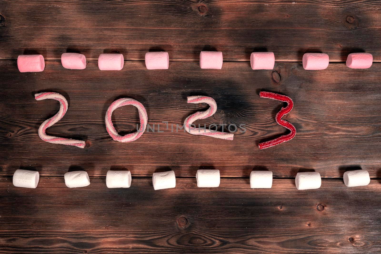 new year concept. text 2023 made from gummies