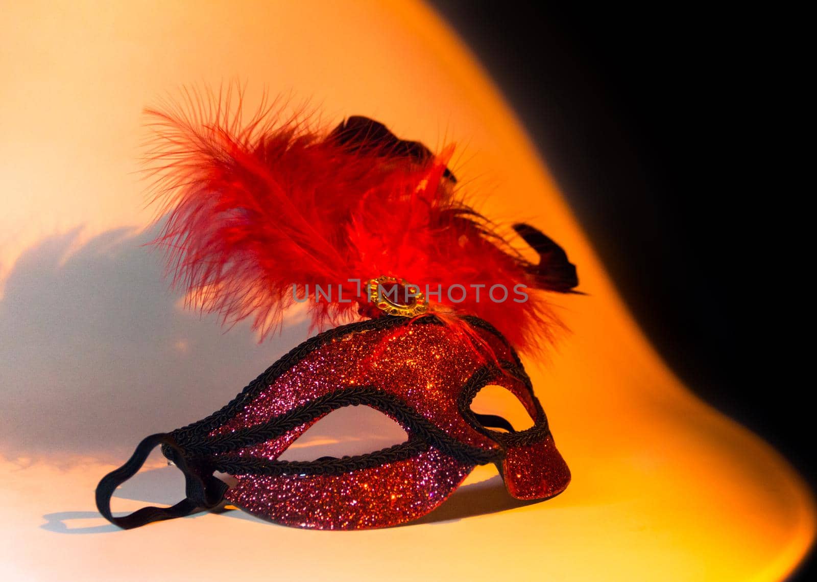carnival symbol mask in golden red color with feathers by GabrielaBertolini