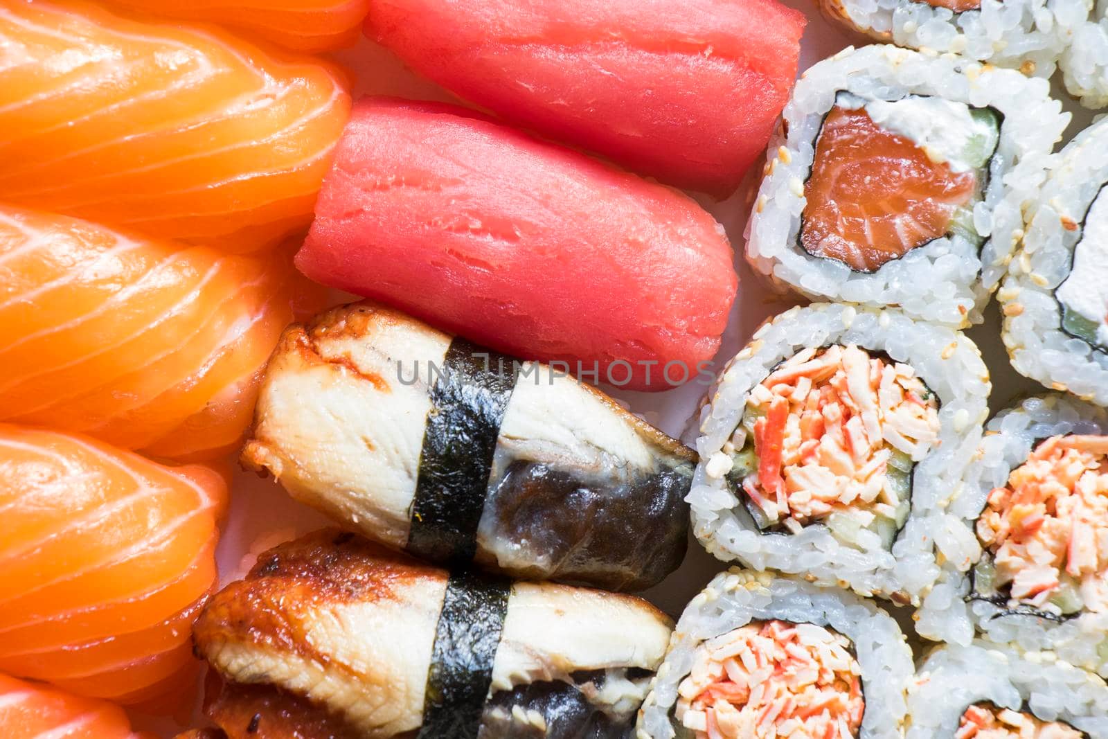 Nigiri sushi set, salmon, tuna and shrimp sushi by Taidundua