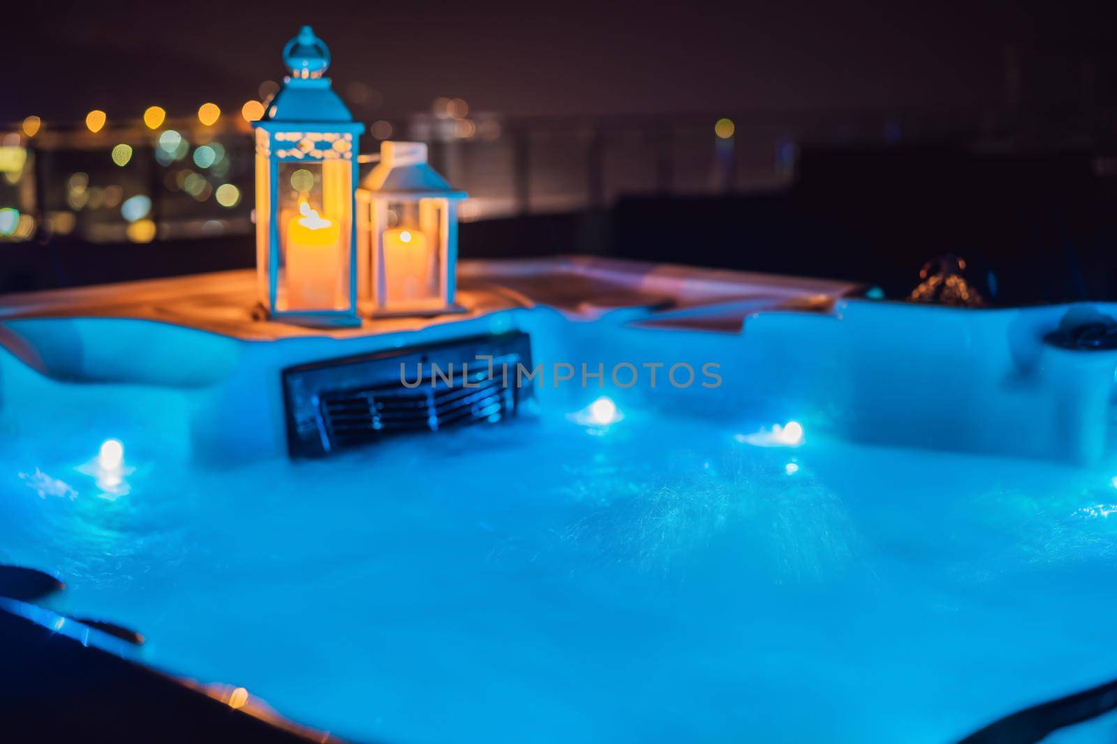 Hot tub with candles ready to take a bath. Valentines day concept by galitskaya