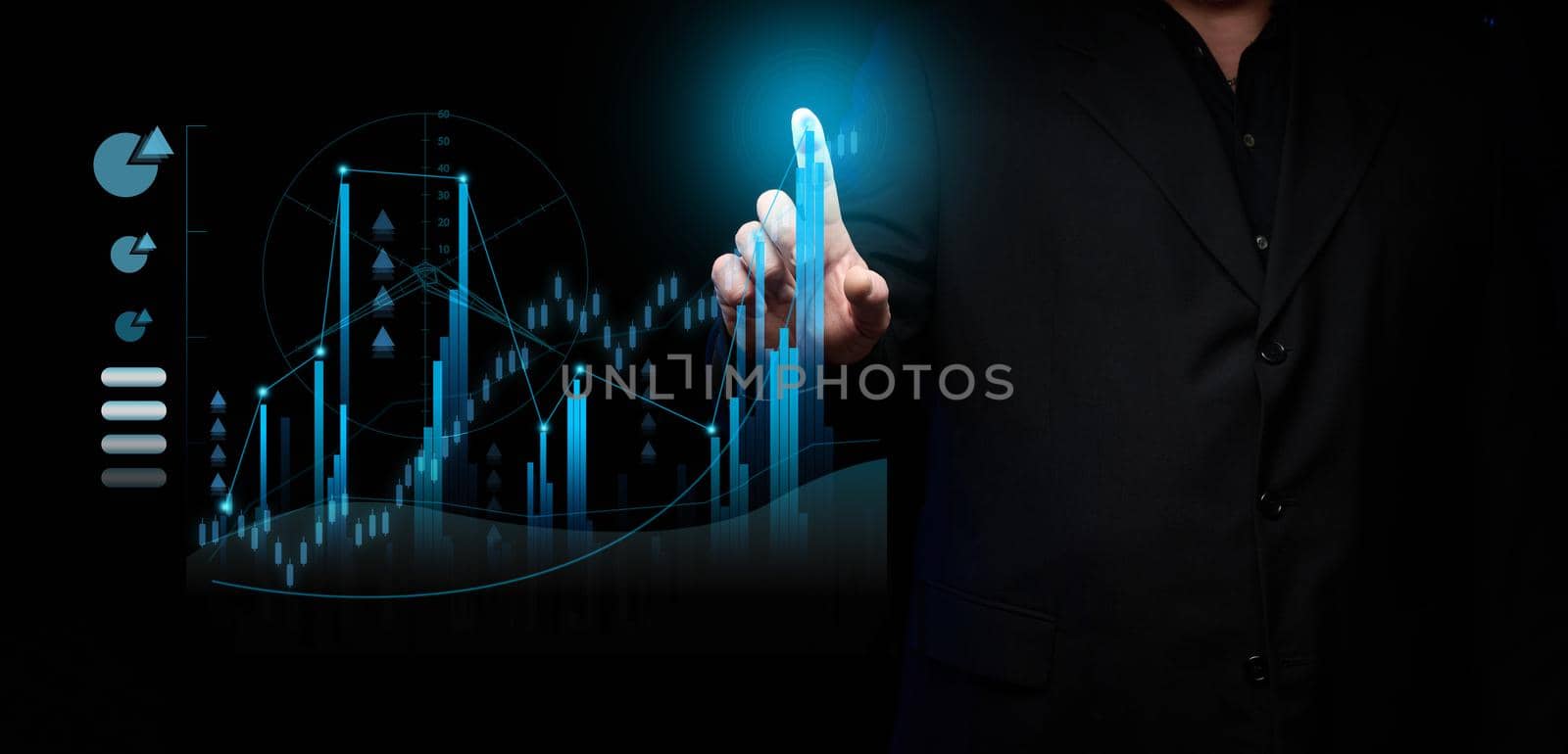 a male businessman stands in a black suit in front of a holographic ddiagram with graphs and growing indicators by ndanko