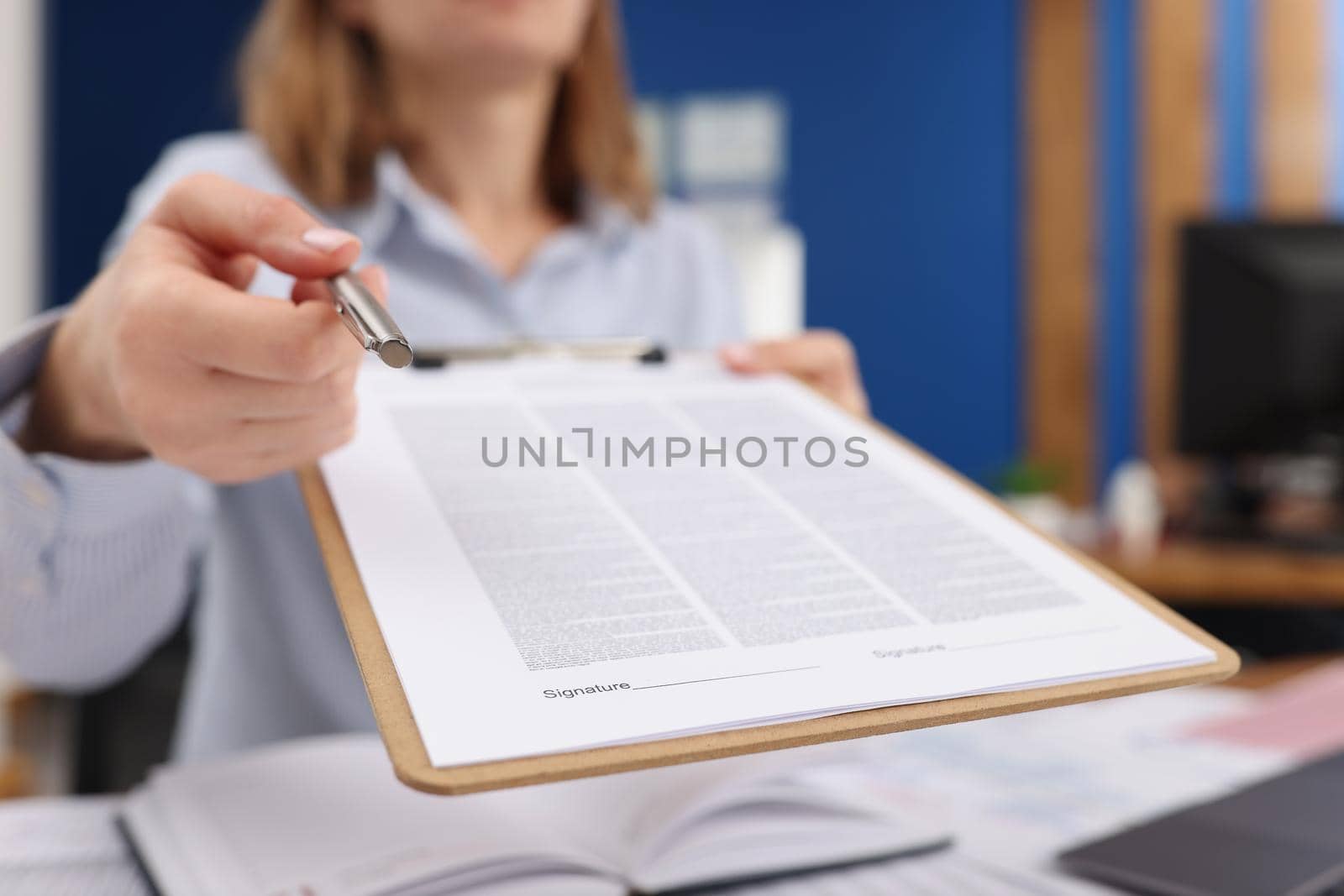Close-up of businesswoman give silver pen to client to put signature on contract paper. Prepared business document for client. Business, agreement concept