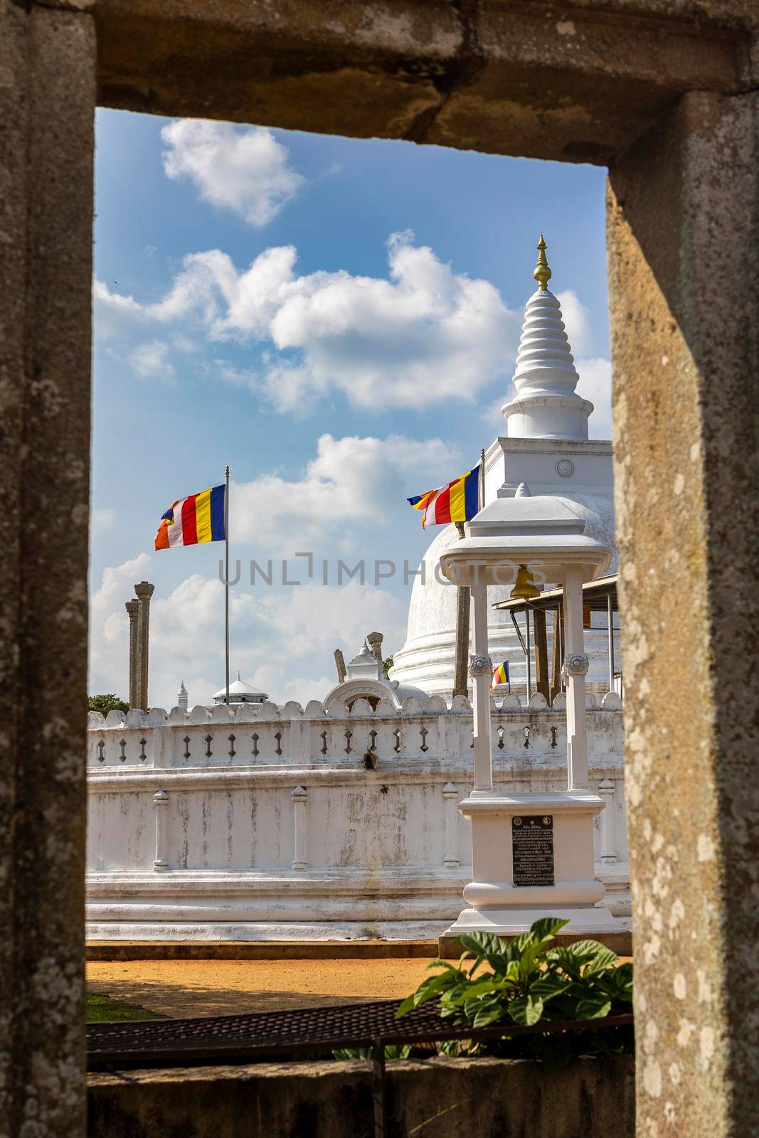 Sri Lanka. Anuradhapura. Thuparamaya Stupa is the earliest Dagoba to be constructed in the island. Shooting through an old concrete frame. High quality photo