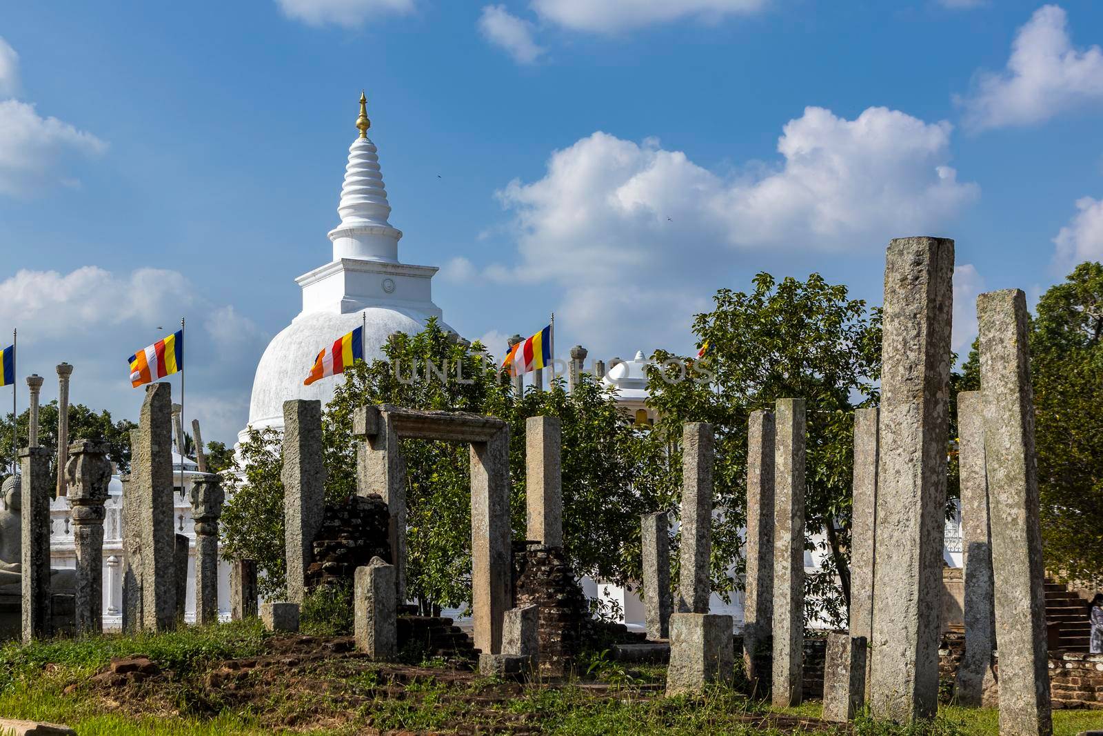 Sri Lanka. Anuradhapura. Thuparamaya Stupa is the earliest Dagoba to be constructed in the island. Shooting through ancient columns. High quality photo