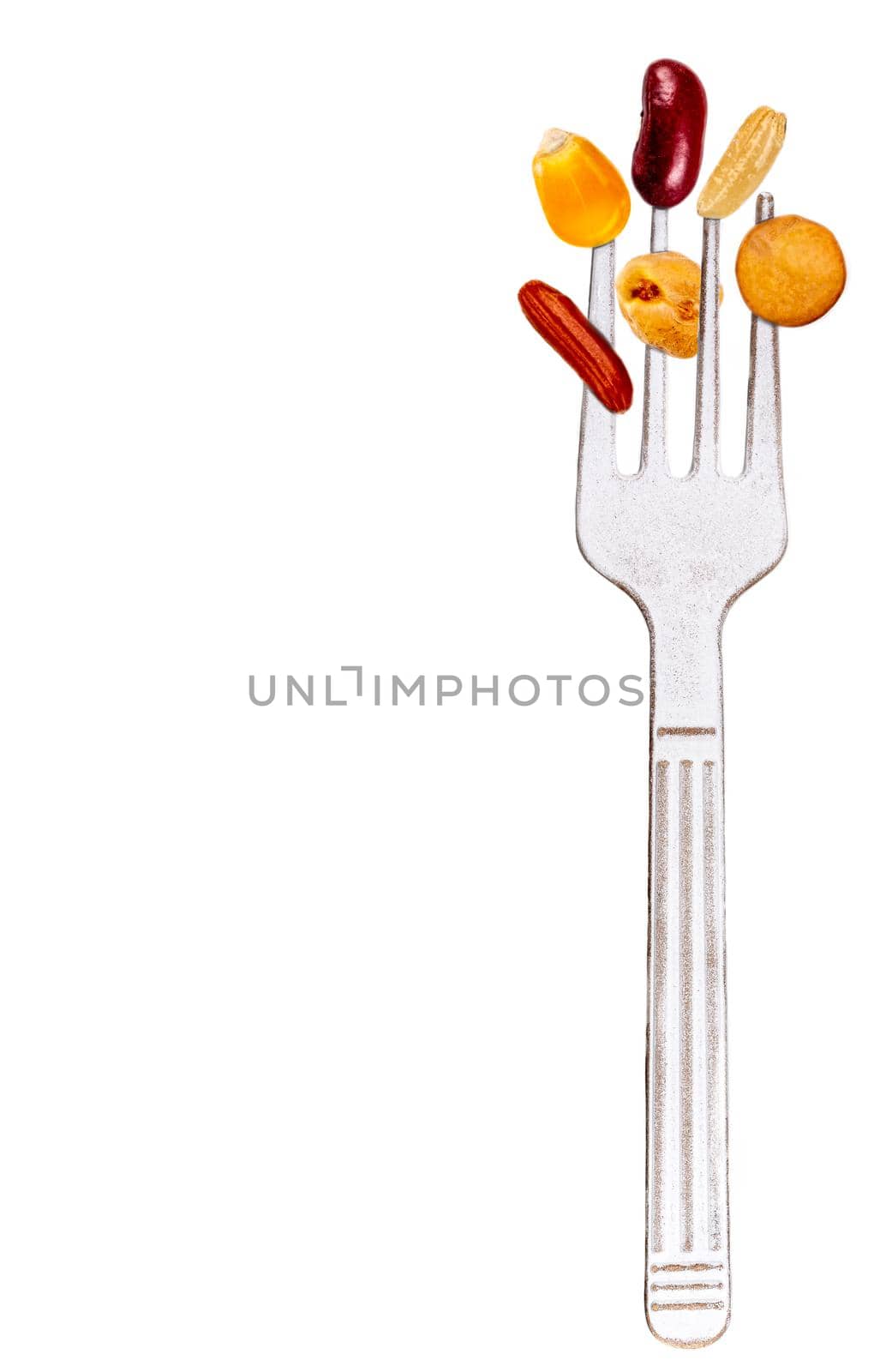 Fork containing, rice,corn beans lentil chickpeas conceptual photos