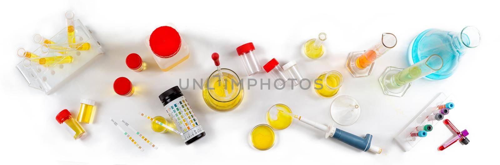 Conceptual image on urine alysis, dipstick, urine vials,Urine Tests Measurement close up view by JPC-PROD