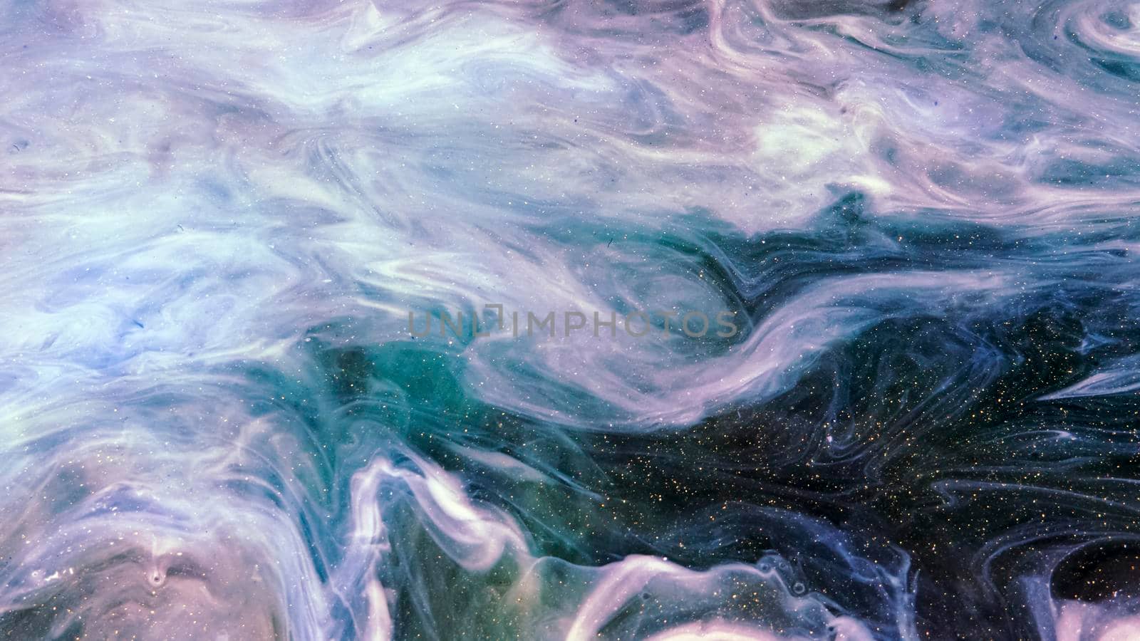 Fluid paint art, marble abstractions in blue, black and yellow. Deep ink blanks. Abstract unique colorful background. Artistic painting of natural spreading. Abstract textural art. Liquid forms of design. Ink transitions. Colorful cell background, splash screen, background.