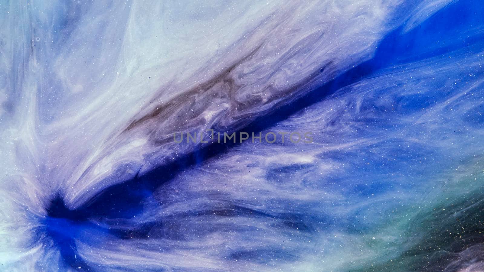 Fluid paint art, marble abstractions in blue, black and yellow. Deep ink blanks. Abstract unique colorful background. Artistic painting of natural spreading. Abstract textural art. Liquid forms of design. Ink transitions. Colorful cell background, splash screen, background.