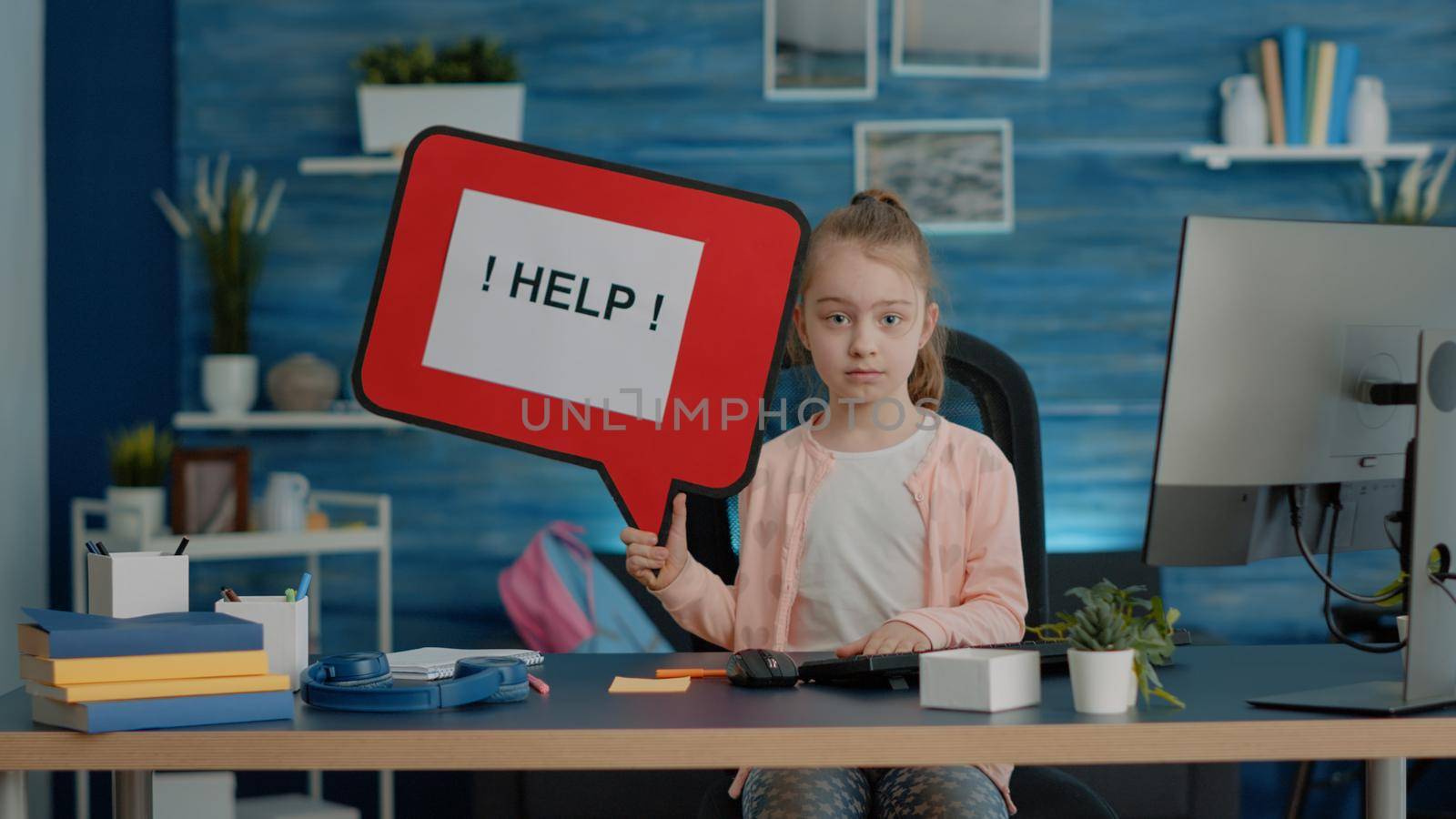 Young child holding speech bubble and asking for help by DCStudio
