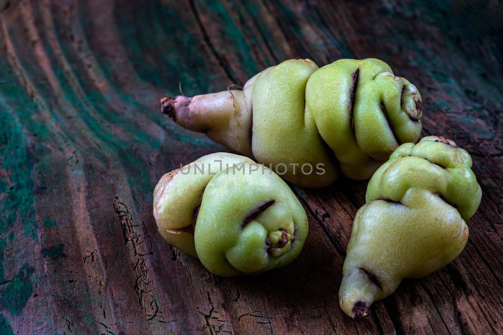 Three tubers in close-up on a vett background