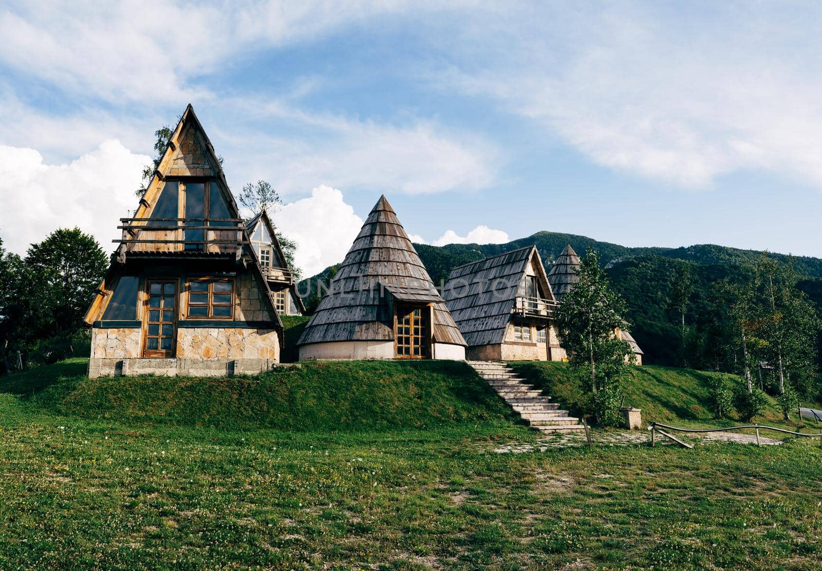 Triangular and cone-shaped houses in the north of Montenegro. High quality photo