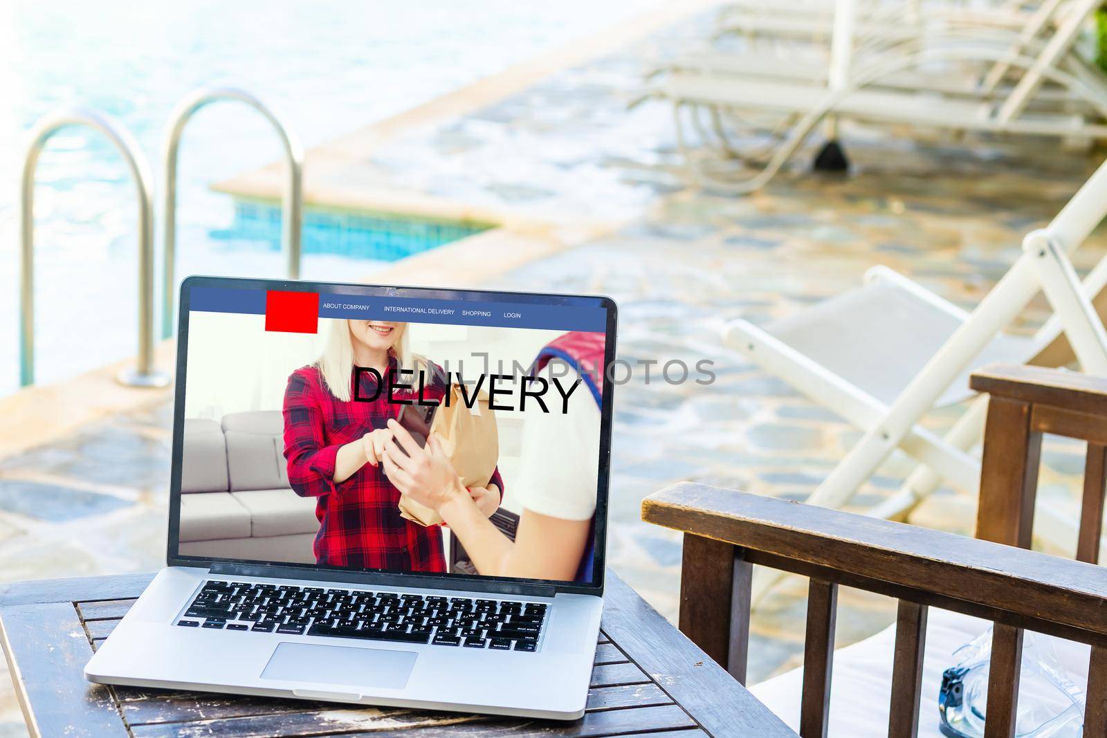 delivery icon on laptop keyboard. Online shopping, ecommerce and retail sale concept, delivery for customers ordering things from retailers websites using internet by Andelov13