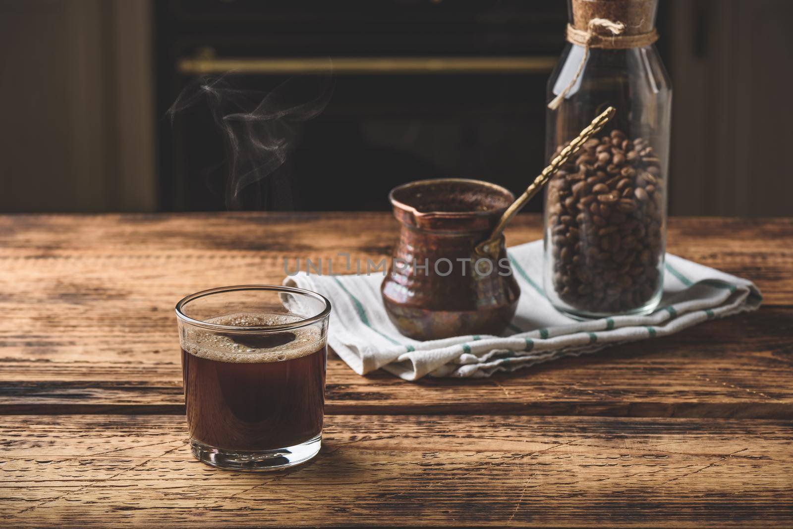 Freshly brewed turkish coffee in drinking glass by Seva_blsv