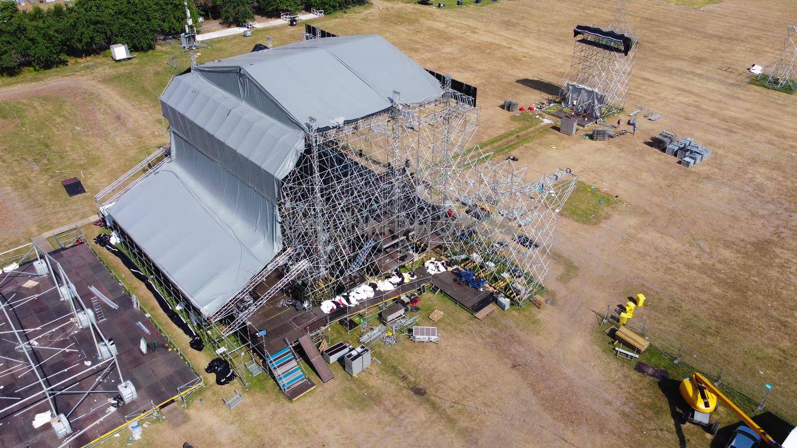 workers build a concert stage. Concept High-rise works. metal designs.