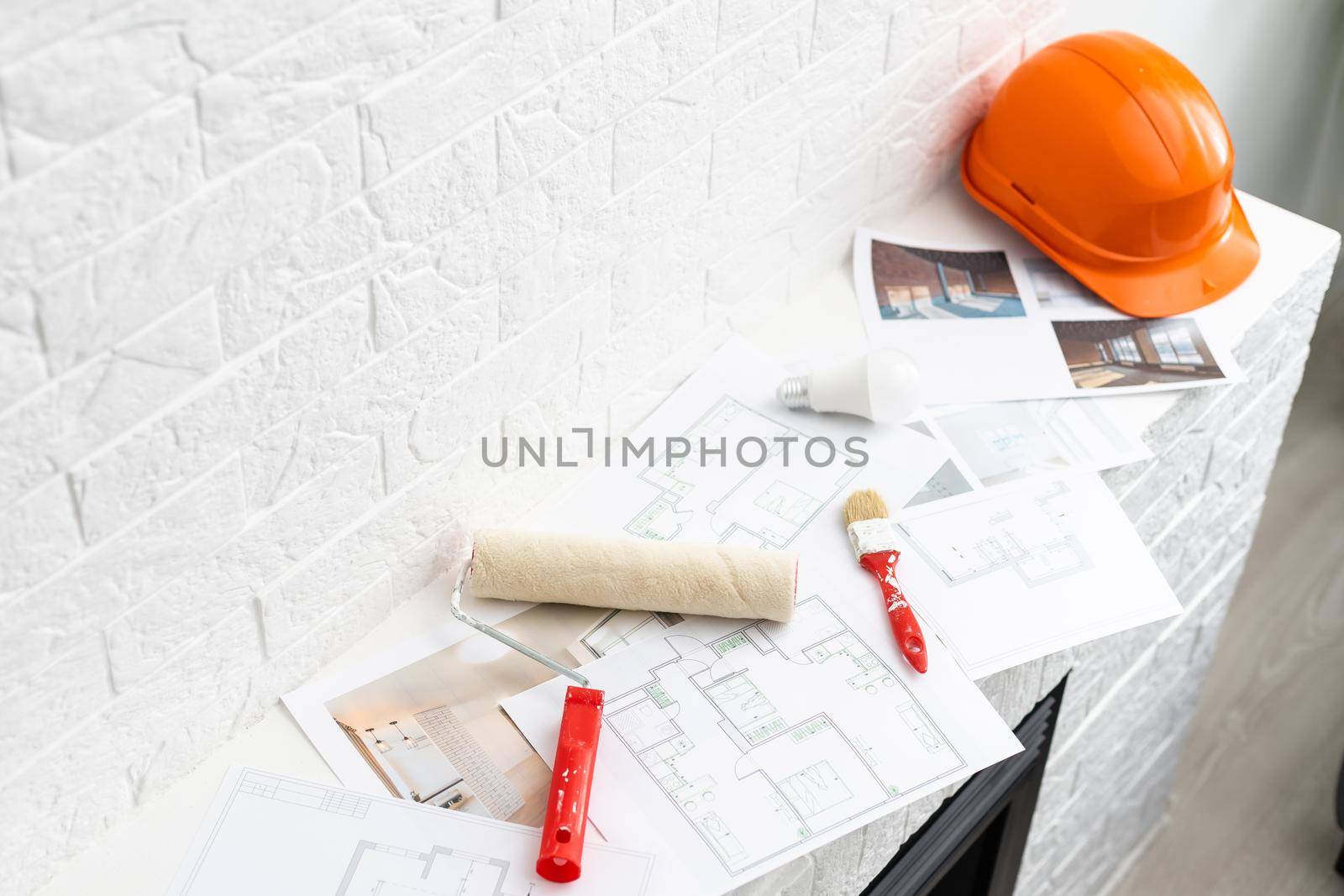 Construction blueprints with tools and tablet, top view by Andelov13
