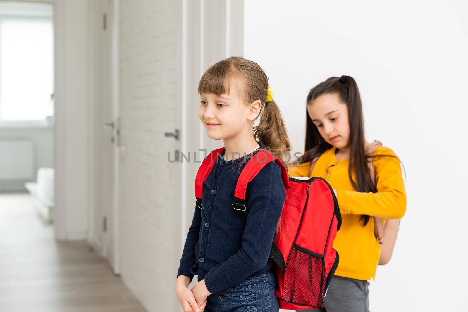 Two pupils of elementary school, Back to school