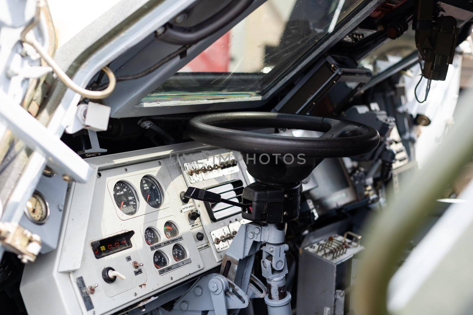 Large caliber machine gun with a rotary turret on the tank closeup. by Andelov13