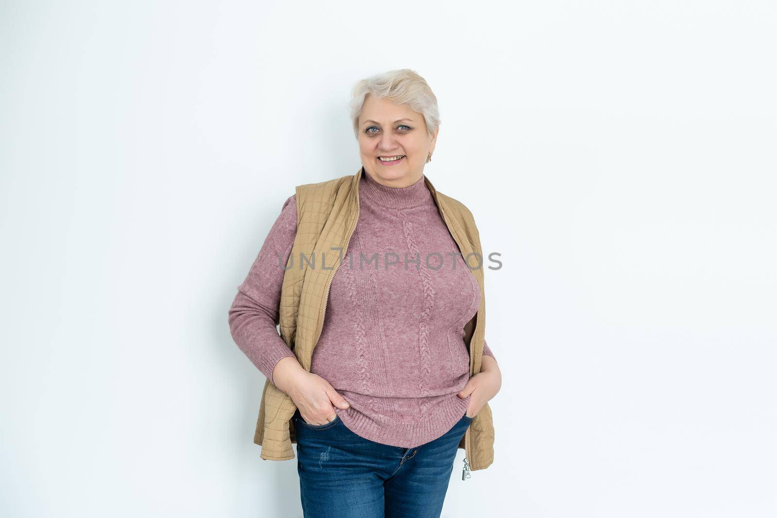 Smiling happy woman. Isolated over white background by Andelov13