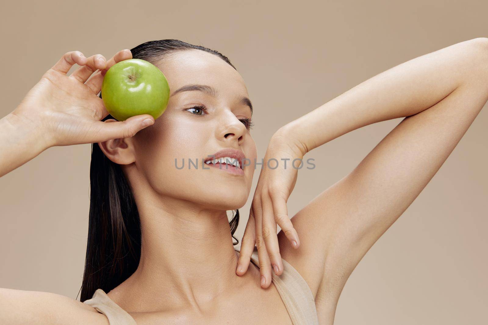 portrait woman apple in hands posing fruit healthy food fresh close-up Lifestyle. High quality photo
