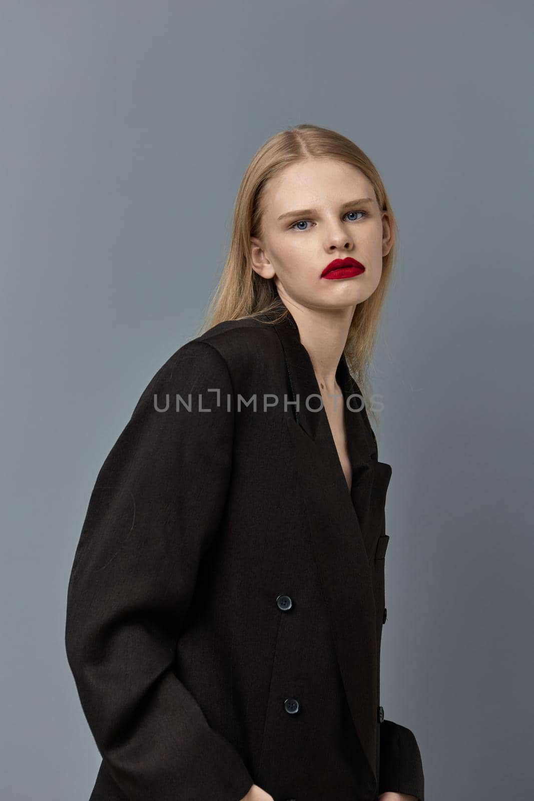 glamorous woman fashion makeup in black jacket isolated background by SHOTPRIME